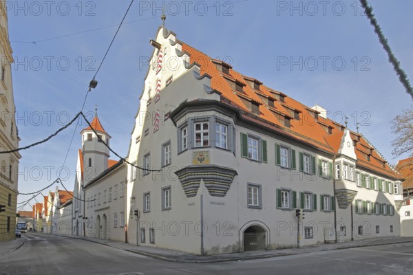 Former Holy Spirit Hospital building built in 1564 with hospital church, today Bürgerheim nursing center, Nördlingen, Bavaria, Germany