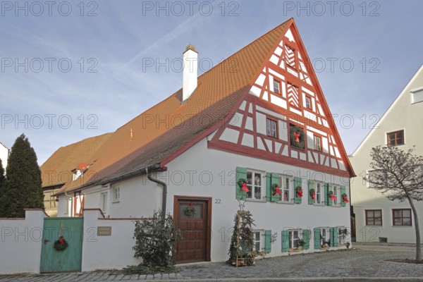 Historic half-timbered house built in 18th century with Christmas decoration, Bauhofgasse, Nördlingen, Bavaria, Germany