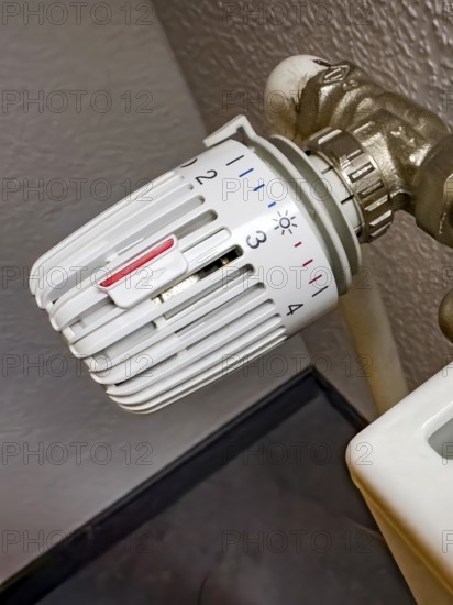 Heating thermostat is below level 2 to reduce night time to save energy Germany