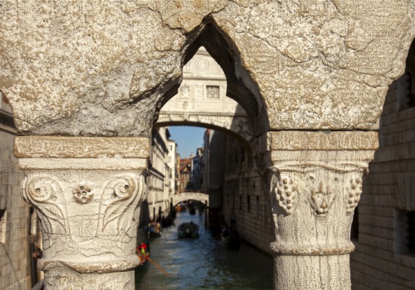View of the Bridge of Sighs through the railing of the Ponte della Paglia, Venice, Veneto, Italy