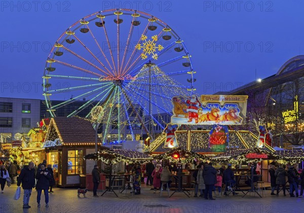 The Christmas market with the Ferris wheel in the evening, Hagen, Ruhr area, North Rhine-Westphalia, Germany