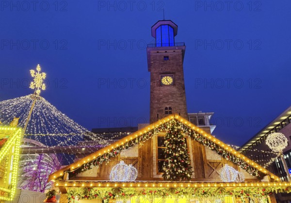 The Christmas market with the town hall tower in the evening, Hagen, Ruhr area, North Rhine-Westphalia, Germany