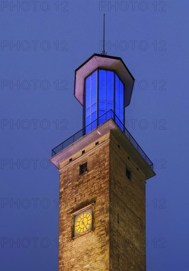 The illuminated and illuminated town hall tower in the evening, Hagen, Ruhr area, North Rhine-Westphalia, Germany