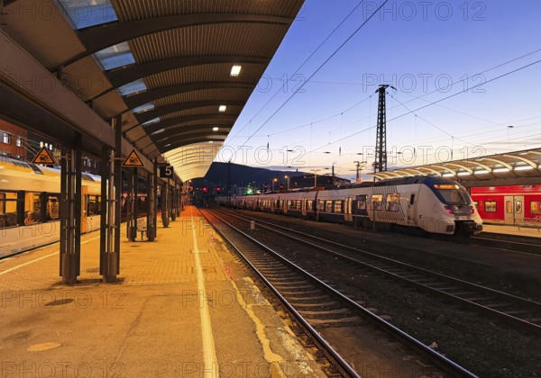 Deserted platform with regional express in the evening, central railway station, Hagen, North Rhine-Westphalia, Germany