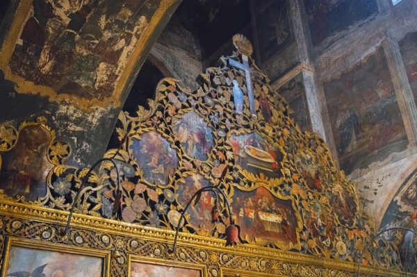 Detailed church paintings with golden decorations and iconic representations in a church, Bodbe monastery, Sighnaghi, Signagi, Kakheti province, Greater Caucasus, Georgia, Western Asia