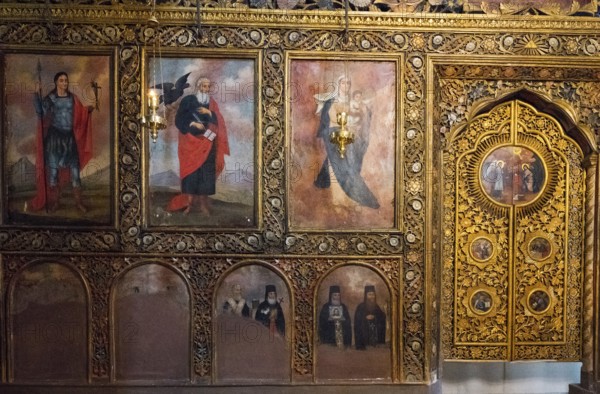 Iconic wall decoration with religious motifs and golden details in a church, Bodbe monastery, Sighnaghi, Signagi, Kakheti province, Greater Caucasus, Georgia, Western Asia