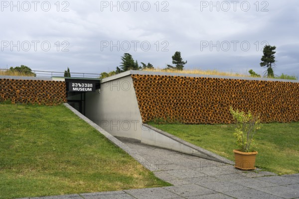 Modern museum with grass roof and tile cladding, minimalist architectural design, Historical Museum, Batonis Ziche Fortress, Telavi, Kakheti region, Georgia