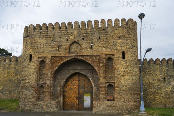 Historic fortress with high archway and massive stone walls, medieval charm, entrance gate, Batonis Ziche fortress, Telavi, Kakheti region, Georgia