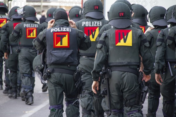 June 10, 2012 Demonstration in Göppingen, Baden-Württemberg, Germany. Units of the Baden-Württemberg riot police are moving together towards a demonstration in urban areas in order to prepare for deployment to ensure public order