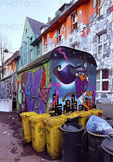 Kiefernstraße with street art and artistically designed construction trailer and street art from the left-wing alternative scene, Flingern, Düsseldorf, North Rhine-Westphalia, Germany