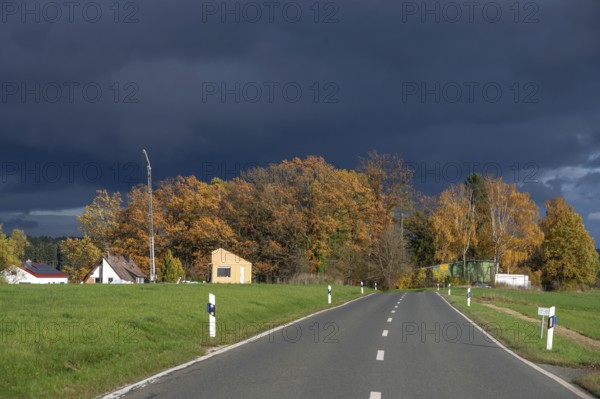 Stormy sky with autumn trees, Neunhof bei Lauf, Middle Franconia, Bavaria, Germany