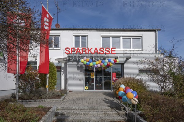 Sparkasse branch decorated on World Savings Day, Eckental, Miittelfranken, Bavaria, Germany