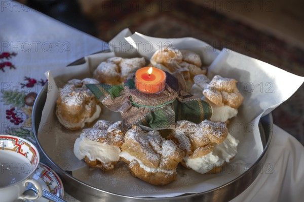 Cream puffs decorated on a tray, Franconia, Bavaria, Germany