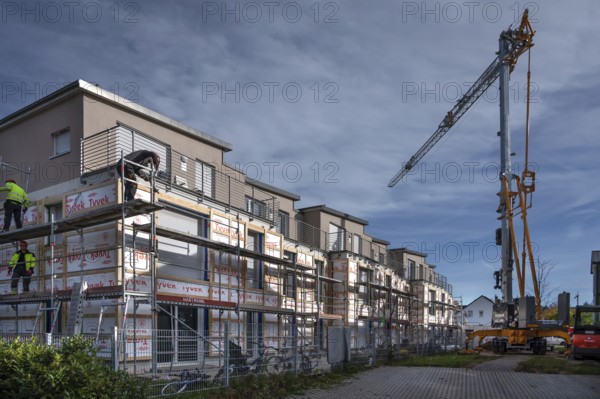 Thermal insulation is being installed on a residential block, Eckental, Mittelfranken, Bavaria, Germany
