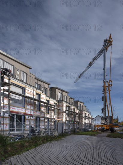 Thermal insulation is being installed on a residential block, Eckental, Mittelfranken, Bavaria, Germany