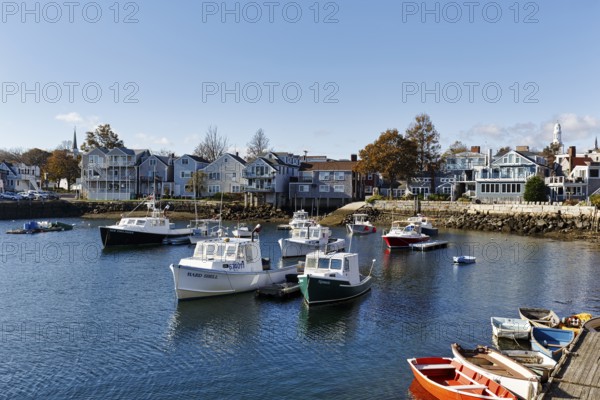 Scenic view of fishing boats and typical architecture, blue sky, Bradley Wharf, Bearskin Neck, Rockport, Cape Ann, Massachussets, New England, USA