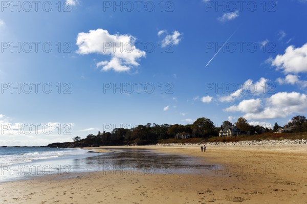 Two walkers on sandy beach, Cumulus, Singing Beach, Manchester-by-the-Sea, Cape Ann, Massachusetts, New England, USA