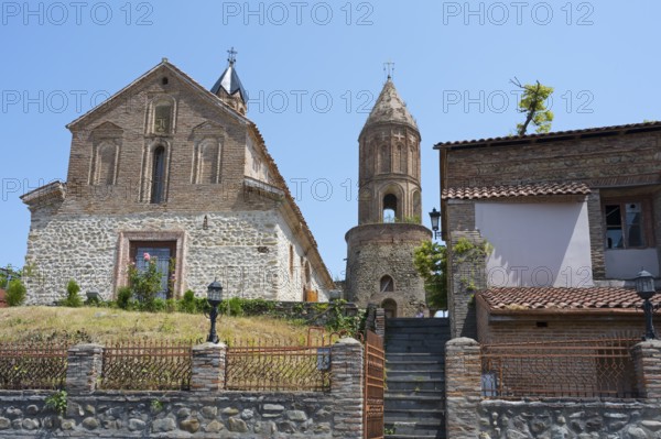 Historic church architecture with high tower under clear blue sky, St. George Church, St. George, Old Town, Sighnaghi, Signagi, Kakheti Province, Greater Caucasus, Georgia, Western Asia