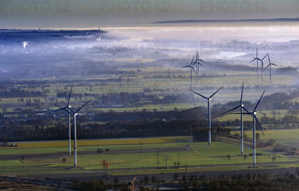 Wind turbine and high-voltage masts, view from Bergedorf to Geesthacht