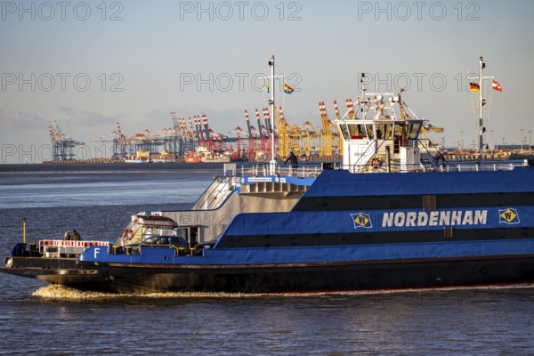 Weser ferry, ferry Nordenham, in the mouth of the Weser, connects Bremerhaven with Nordenham in Lower Saxony, ferry port in the Blexen district, in the background overseas port Bremerhaven, Germany