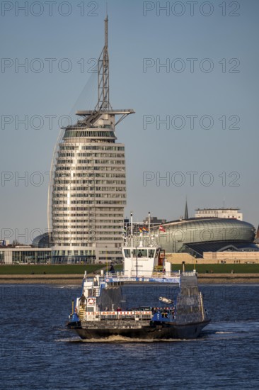 Weser ferry, ferry Nordenham, in the mouth of the Weser, connects Bremerhaven with Nordenham in Lower Saxony, ferry port in the Blexen district, in the background Havenwelten Bremerhaven, Germany