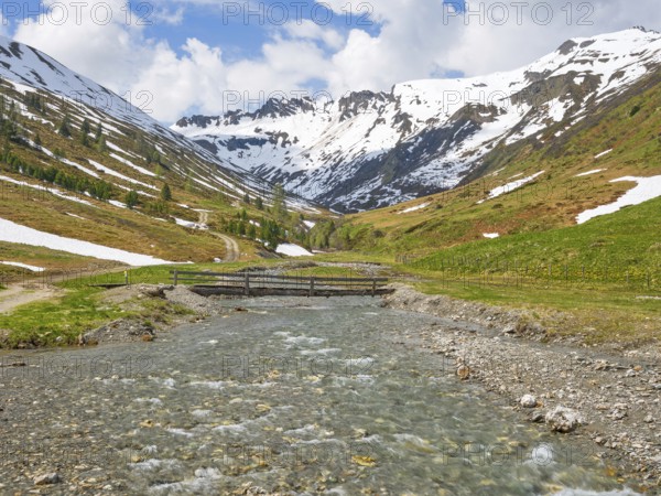 Riedingtal nature park Park, Riedingbach, snow-capped mountains, stream with bridge, hiking, Zederhaus, Lungau, Salzburg