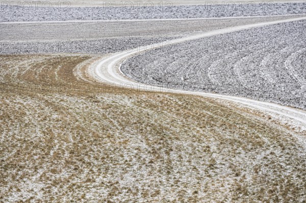 Winter landscape in the Swabian Jura. There is hoarfrost in the fields. Münsingen, Baden-Württemberg, Germany