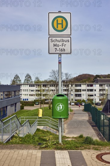School bus stop, public trash can, general architecture, houses, modern architecture, apartment buildings, secondary school, trees, meadow, slightly diffused light, slightly sunny, milky blue sky, cumulus clouds, cirrostratus clouds, Dresdener Straße, Sprockhövel, Ennepe-Ruhr district, North Rhine-Westphalia, Germany