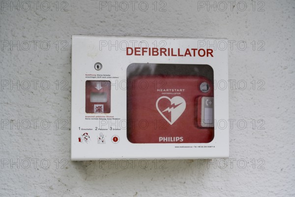 Defibrillator on a house wall, Gmund, Upper Bavaria, Bavaria, Germany