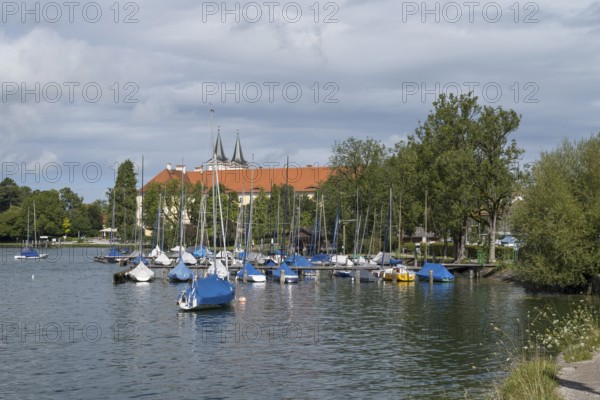 Parish Church of St. Quirinus, Tegernsee Abbey, Castle with Braustüberl, boats on the lake, village Tegernsee, Upper Bavaria, Bavaria, Germany