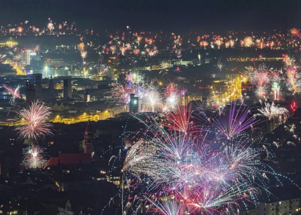 Stuttgart welcomes the new year 2026. Fireworks over the city center. Stuttgart, Baden-Württemberg, Germany