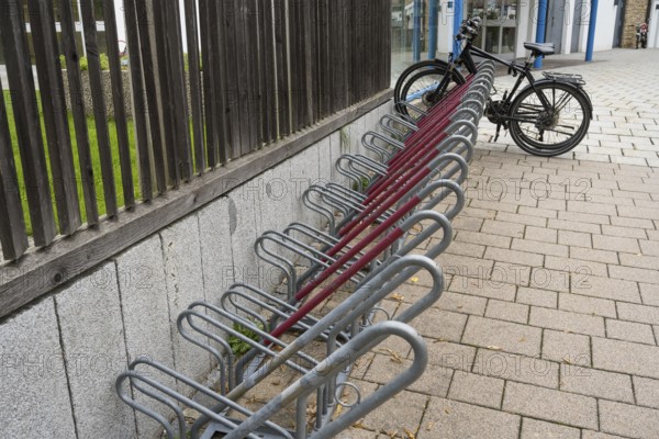 Several bike racks next to each other, bikes on bike racks, Bavaria, Germany
