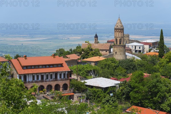 Scenic view of a town with church tower and hilly landscape, Church of St. George, Sighnaghi, Signagi, Kakheti Province, Greater Caucasus, Georgia, Western Asia