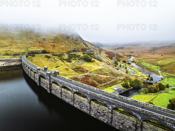 Autumn over Claerwen Dam, Claerwen Valley, Elan Valley Reservoir, Rhayader, Powys, Wales, UK