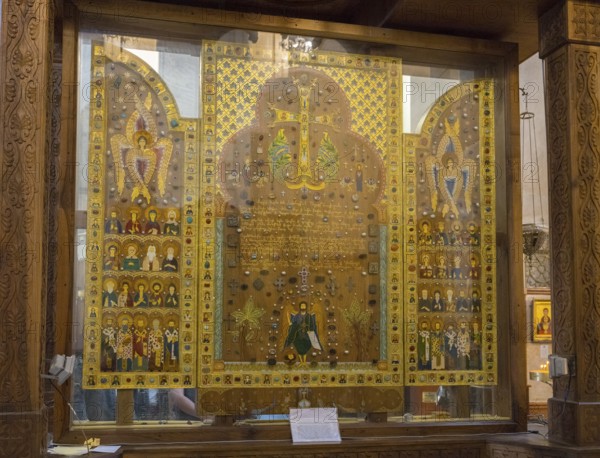 Icons and sacred symbols in an intricately designed glass display case in a church, Sameba Cathedral, Trinity Cathedral, Tbilisi, Georgia