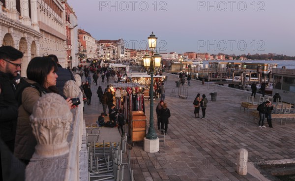 People on Ponte della Paglia and Riva degli Schiavoni, Venice, Veneto, Italy