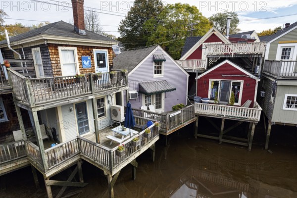 Colourful houses on stilts, Kennebunk River, Tidal River, Kennebunkport, Maine, New England, USA