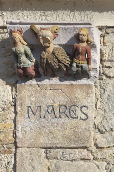 Historical pillory painting with three medieval figures, pillory, grimaces, envy heads, detail, hospital courtyard, market square, Reutlingen, Swabian Jura, Baden-Württemberg, Germany