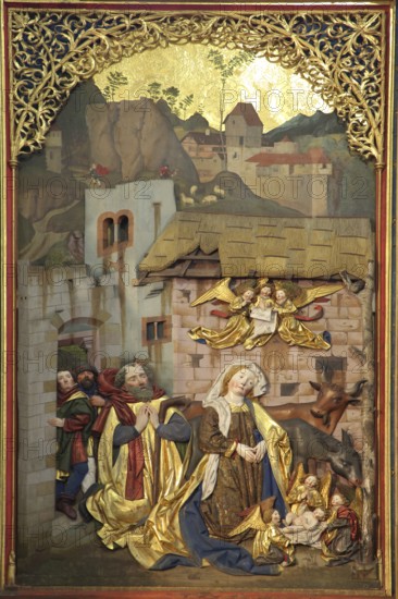 Late Gothic high altar by sculptor Jörg Syrlin the Younger of the Ulm School built in 1494, birth of Jesus, Mary and Joseph, relief, painting, wood carvings, monastery church, interior view, winged altar, handicrafts, artwork, decorations, figures, monastery church, Benedictine monastery, Blaubeuren, Swabian Alb, Baden-Württemberg, Germany