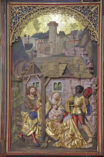 Late Gothic high altar built in 1494 by sculptor Jörg Syrlin the Younger of the Ulm School, Adoration of the Magi, Wise from the East, Infant Jesus, Mary, Birth, Relief, Painting, Wood Carvings, Monastery Church, Interior View, Winged Altar, Arts and Crafts, Ornaments, Figures, Benedictine Monastery, Blaubeuren, Swabian Jura, Baden-Württemberg, Germany