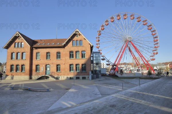 Hospitals and Ferris wheel during the Christmas market, Bürgerpark, Reutlingen, Swabian Alb, Baden-Württemberg, Germany