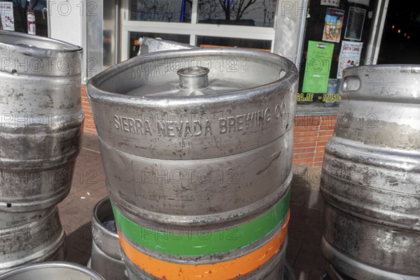Arvada, Colorado - Empty beer kegs stacked outside Cheapskates sports bar in Olde Town Arvada