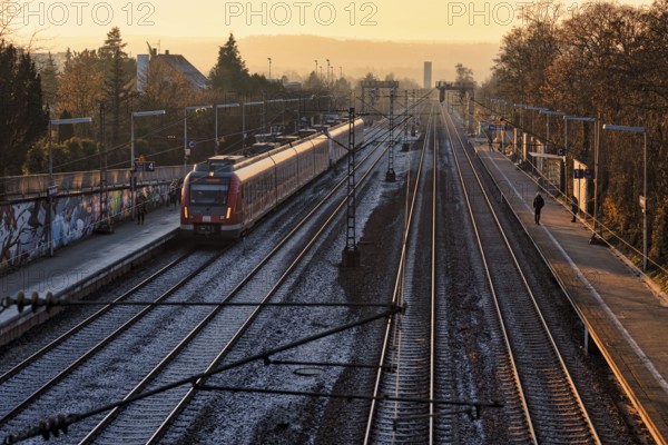 S-Bahn, public transport, train, stops at bus stop, train station, platform, summer rain, sunset, winter light, evening mood, Stuttgart, Baden-Württemberg, Germany