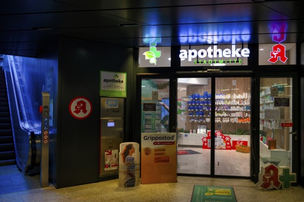 Night view, pharmacy city center, logo, underpass, escalator, neon light, illuminated, Stuttgart, Baden-Württemberg, Germany