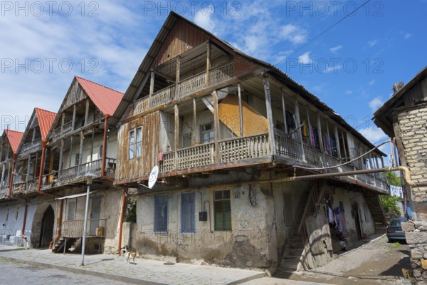 Historic wooden house with veranda under a blue sky, showing traditional architecture, traditional German residential building, Nikolaistraße 44, Bolnissi, Katharinenfeld, founded by Caucasian German settlers, Lower Kartli region, Kwemo Kartli, Georgia