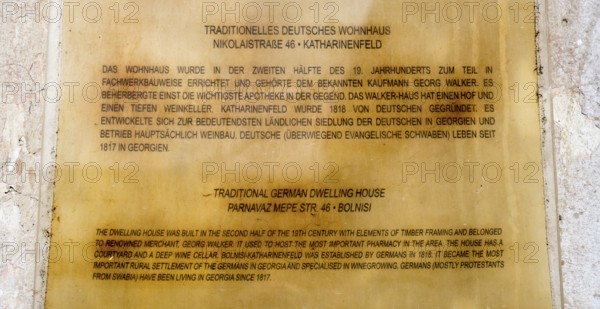 Plaque with inscription about a traditional German residential building and its historical significance, traditional German residential building, Nikolaistraße 46, Bolnissi, Katharinenfeld, founded by Caucasian German settlers, Lower Kartli region, Kwemo Kartli, Georgia