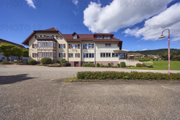 Gasthaus Lime tree, restaurant, hotel, house, lantern, parking lot, trees, hilly landscape, hill, meadow, forest, blue sky, cumulus clouds, street main street, Hofstetten, Black Forest, Ortenaukreis, Baden-Württemberg, Germany