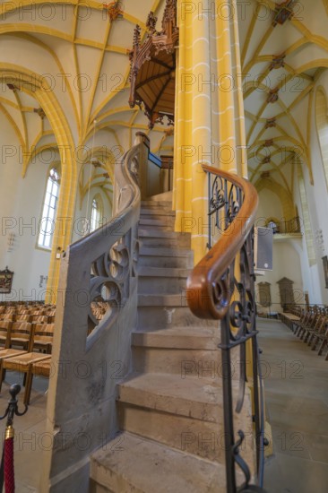 Detailed view of a stone spiral staircase leading to the pulpit with artistic carvings in a church, collegiate church, Herrenberg, Böblingen district, Germany