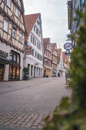 Malersische Altstadtstraße with half-timbered houses and shops, Herrenberg, Böblingen district, Germany
