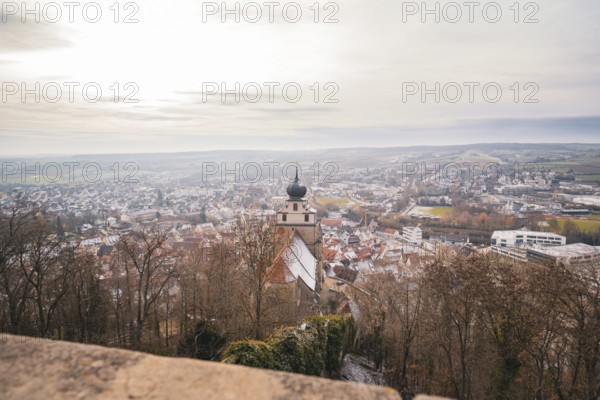 Extensive city view with a church tower in the foreground and a wide landscape, Herrenberg, Böblingen district, Germany